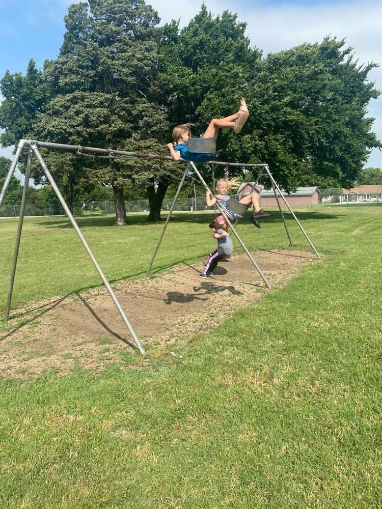 kids swinging 