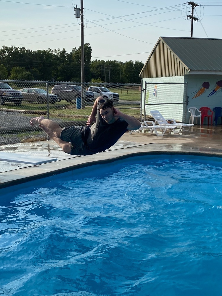 boy jump in pool 